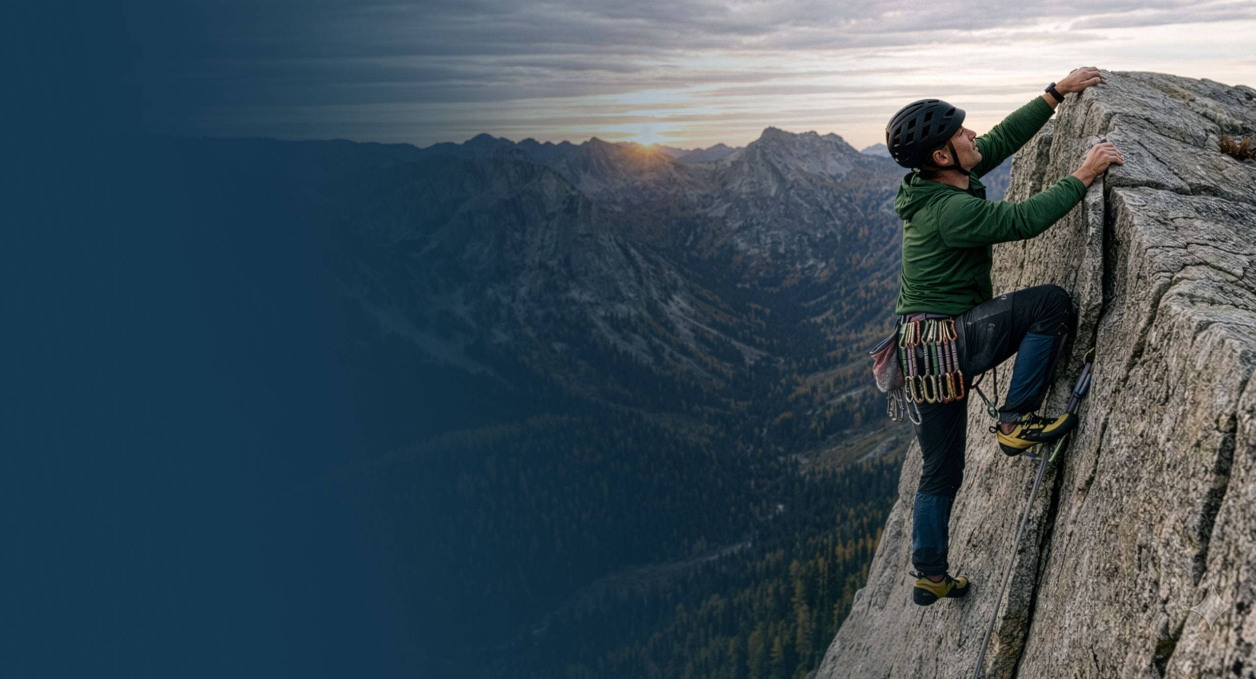 Man Climbing side of a mountain